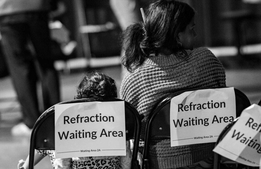 Mother and Daughter waiting for an Eye Exam